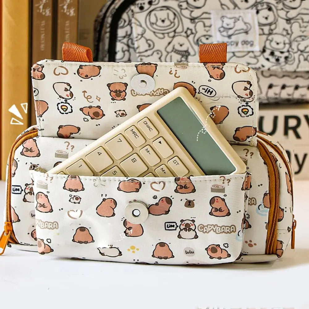 Capybara pattern pencil bag with front flap pocket and visible stationary inside