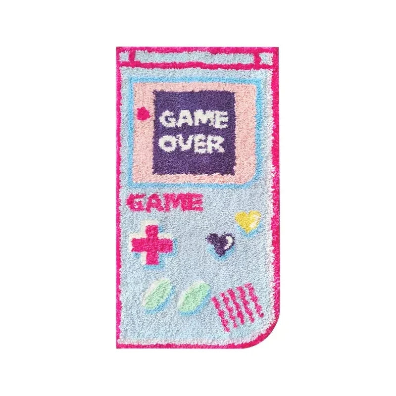 Vertical game themed rug showing “GAME OVER” screen, plus and heart icons; pink trim