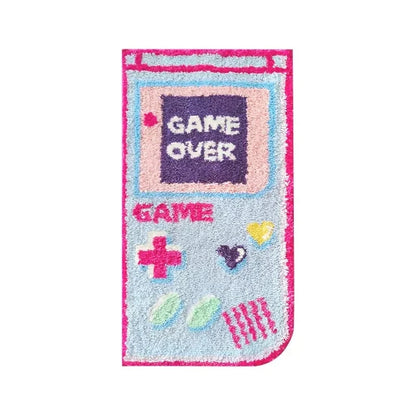 Vertical game themed rug showing “GAME OVER” screen, plus and heart icons; pink trim