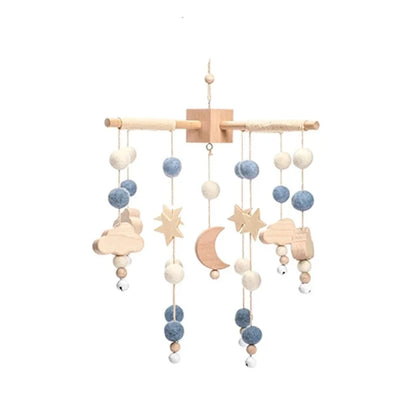 Wooden crib mobile holder with felt star, moon, and cloud hanging toys
