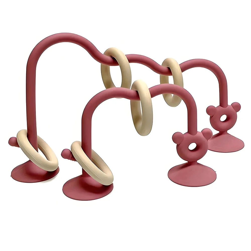 Silicone bead wrap baby learning toy with red/pink loops, suction cups, and mouse-shaped posts