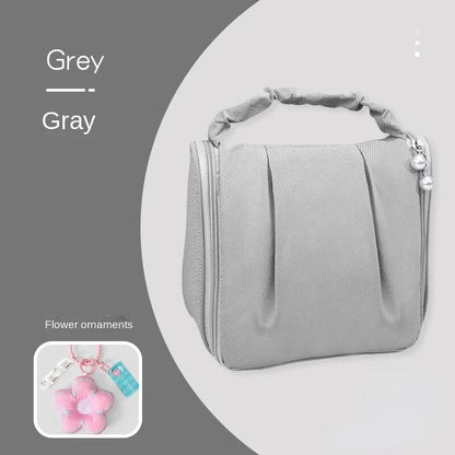Grey hanging makeup bag with flower ornament pendant and beaded side charm