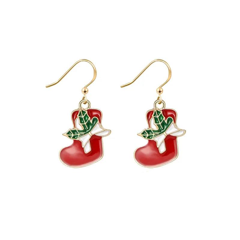 Gold drop earrings with red boot, white dove, green holly leaves, gold charm