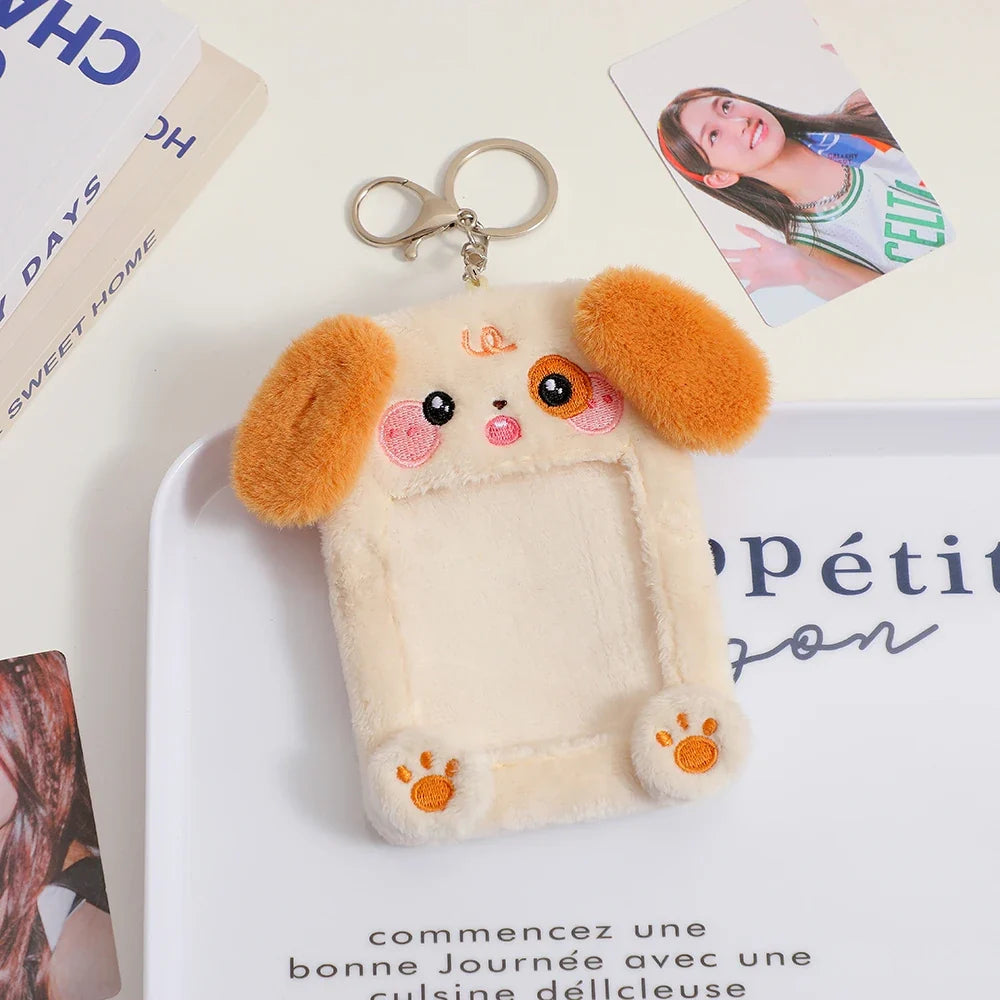 Plush dog photo card holder keychain with beige fur, orange ears, and photo window