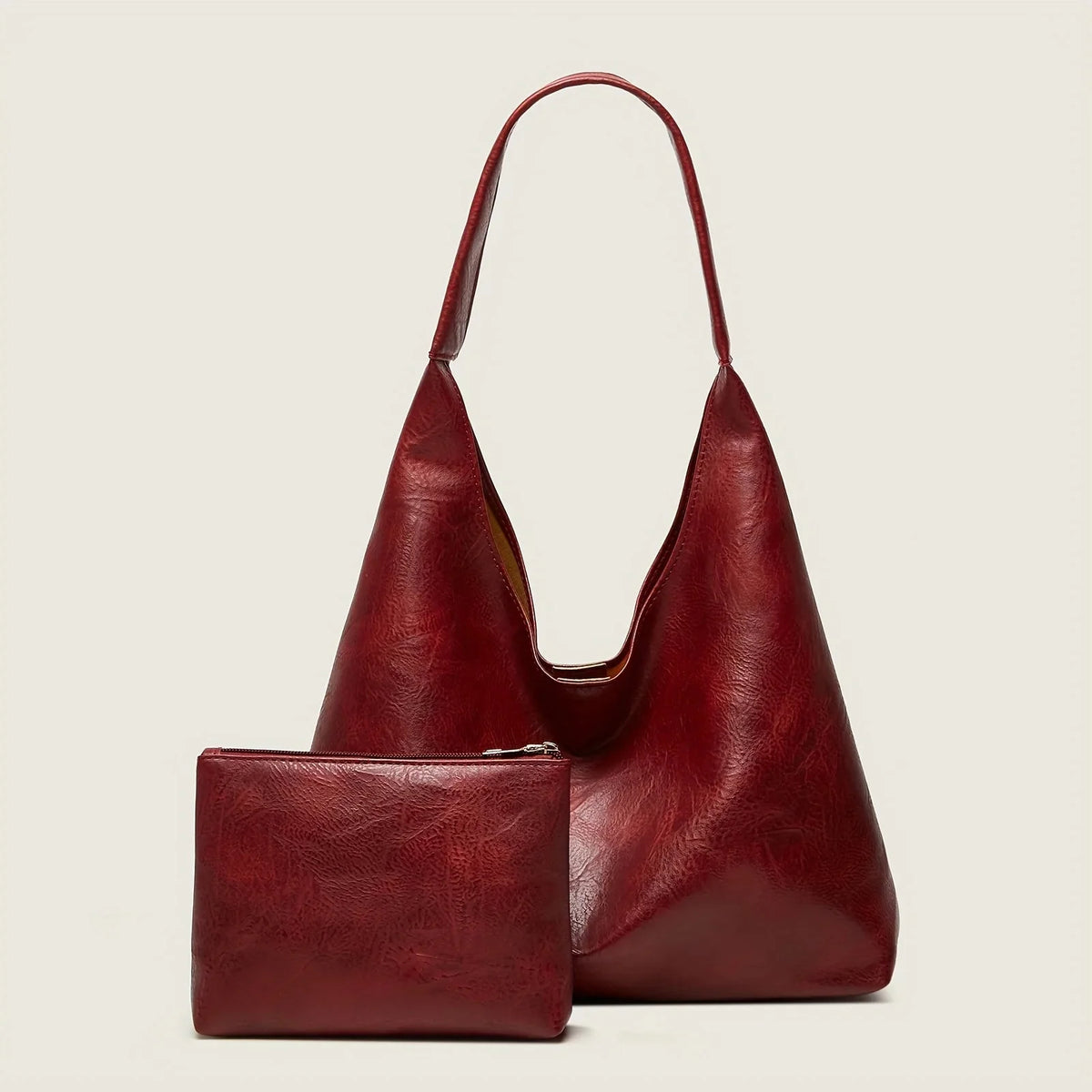 Burgundy leather-look shoulder tote bag with matching zip pouch
