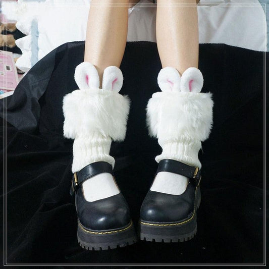 White plush rabbit ear socks with pink inner ears and fuzzy leg cuffs