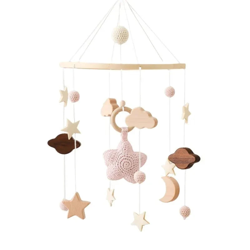 Baby crib mobile with clouds, stars, moon, and crochet hanging toys