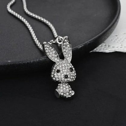 Rhinestone rabbit pendant necklace close-up with chain and black-eyed face