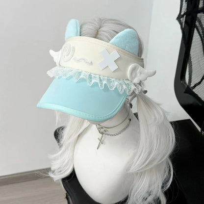 Sky blue cat-ear visor with lace trim and white confused kitty face patch
