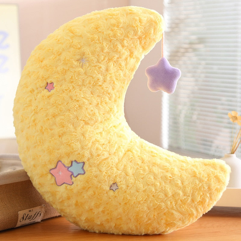 Yellow moon plush pillow with lavender star patch and small stitched star accents