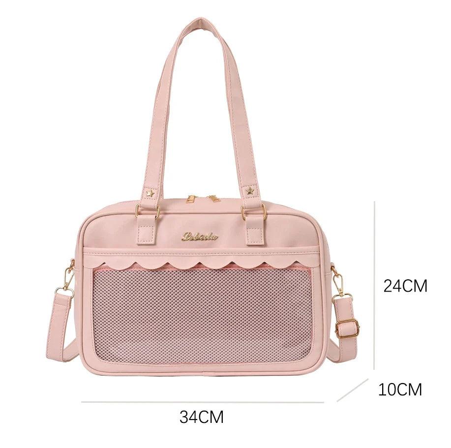 Pink messenger bag with mesh front pocket panel and top carry handles