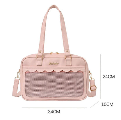 Pink messenger bag with mesh front pocket panel and top carry handles
