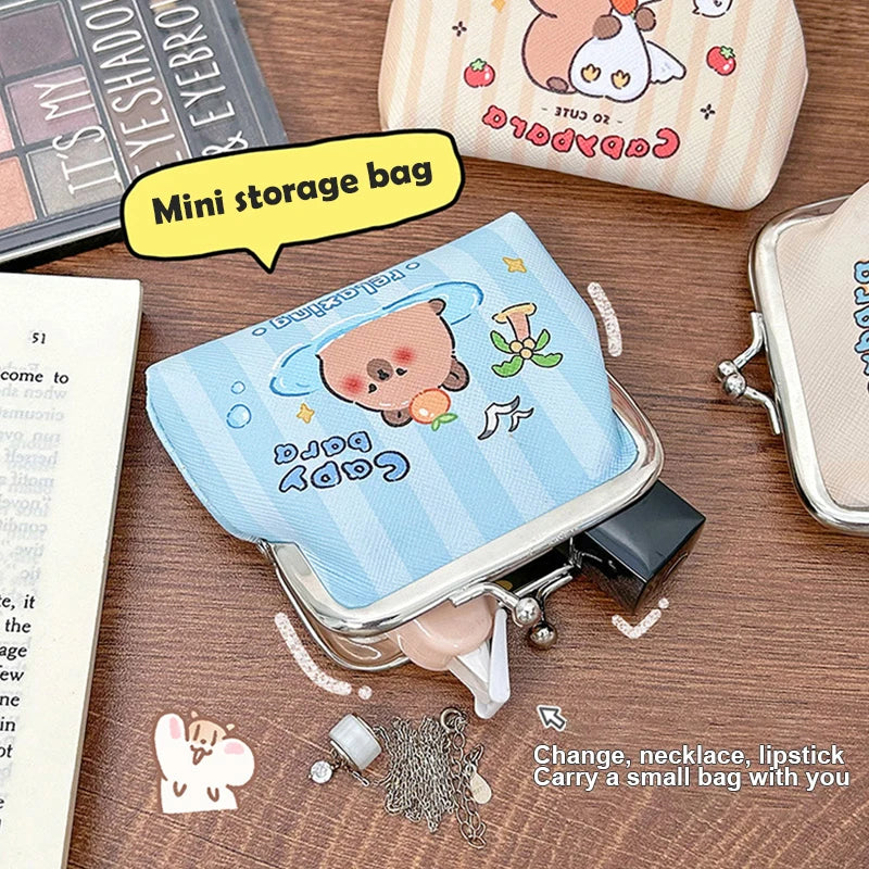 Blue capybara mini coin purse with kiss-lock clasp and playful cartoon bubble print