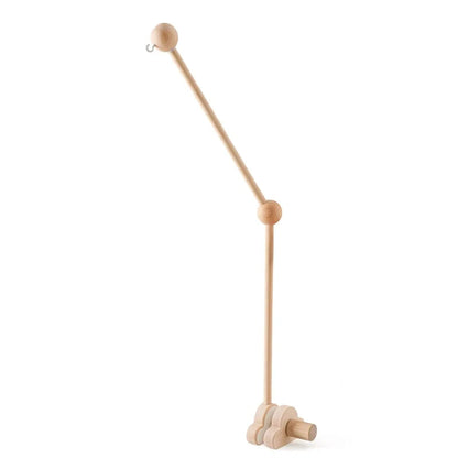 Wooden crib mobile attachment arm with ball joints