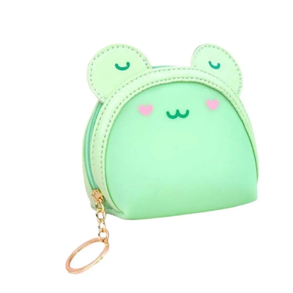Mint green frog-face coin purse with stitched eyes, pink hearts, and gold key ring