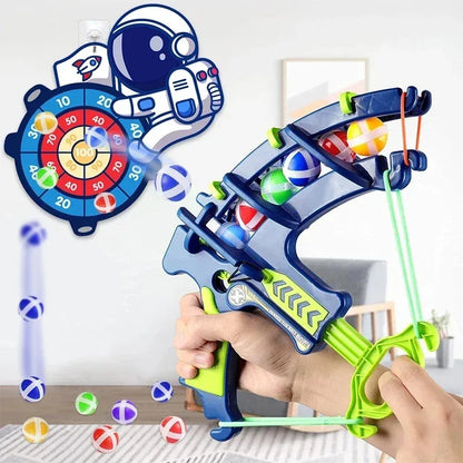 Astronaut-themed dart board toy with ball launcher and numbered target circles