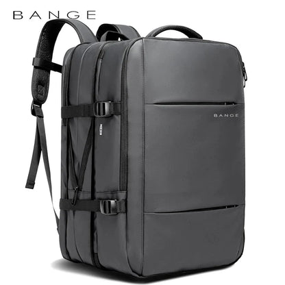 Grey expandable business backpack with front organizer pocket and padded shoulder straps