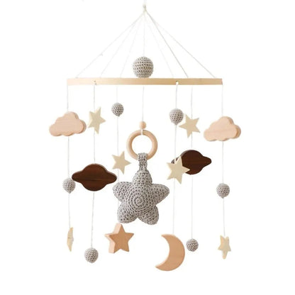 Wooden baby crib mobile with grey star and cloud charms, moon, and hanging bead strands