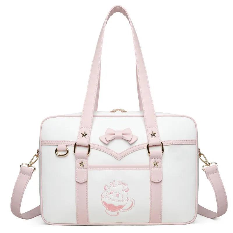 Pink-and-white kawaii messenger bag with bow front, star accents, and crossbody strap