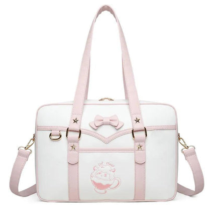 Pink-and-white kawaii messenger bag with bow front, star accents, and crossbody strap