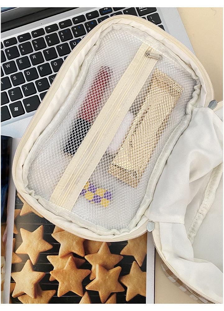 Gingham teddy bear cosmetics bag open with internal mesh pocket and strap