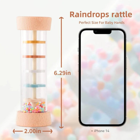 Transparent tube rain rattle with rainbow beads in a light wood frame for babies