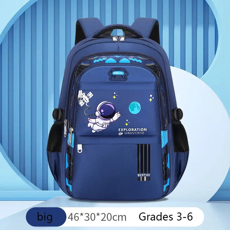 Kids astronaut waterproof school backpack, navy blue with front astronaut graphic and side pockets