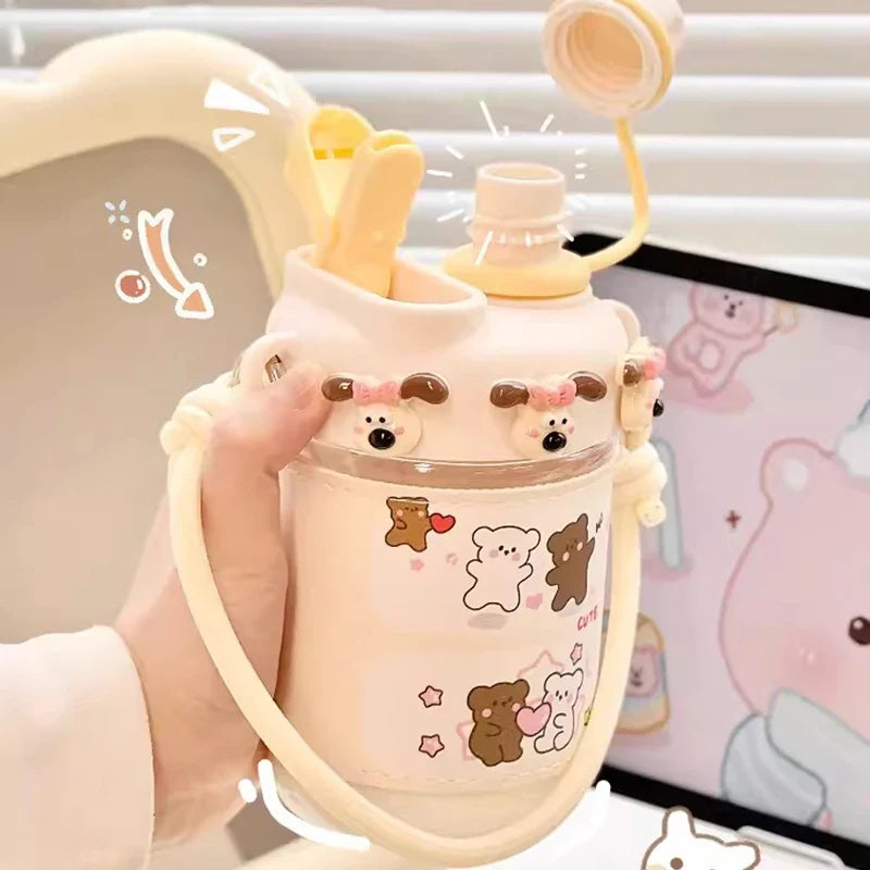 Cream kids water bottle with straw lid and handle strap, cute bear and heart decals