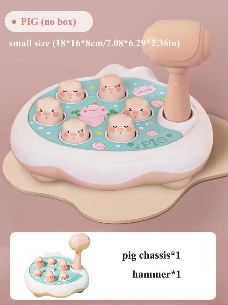 Pig-themed toddler shape hammer toy with pink pig pieces on a round base