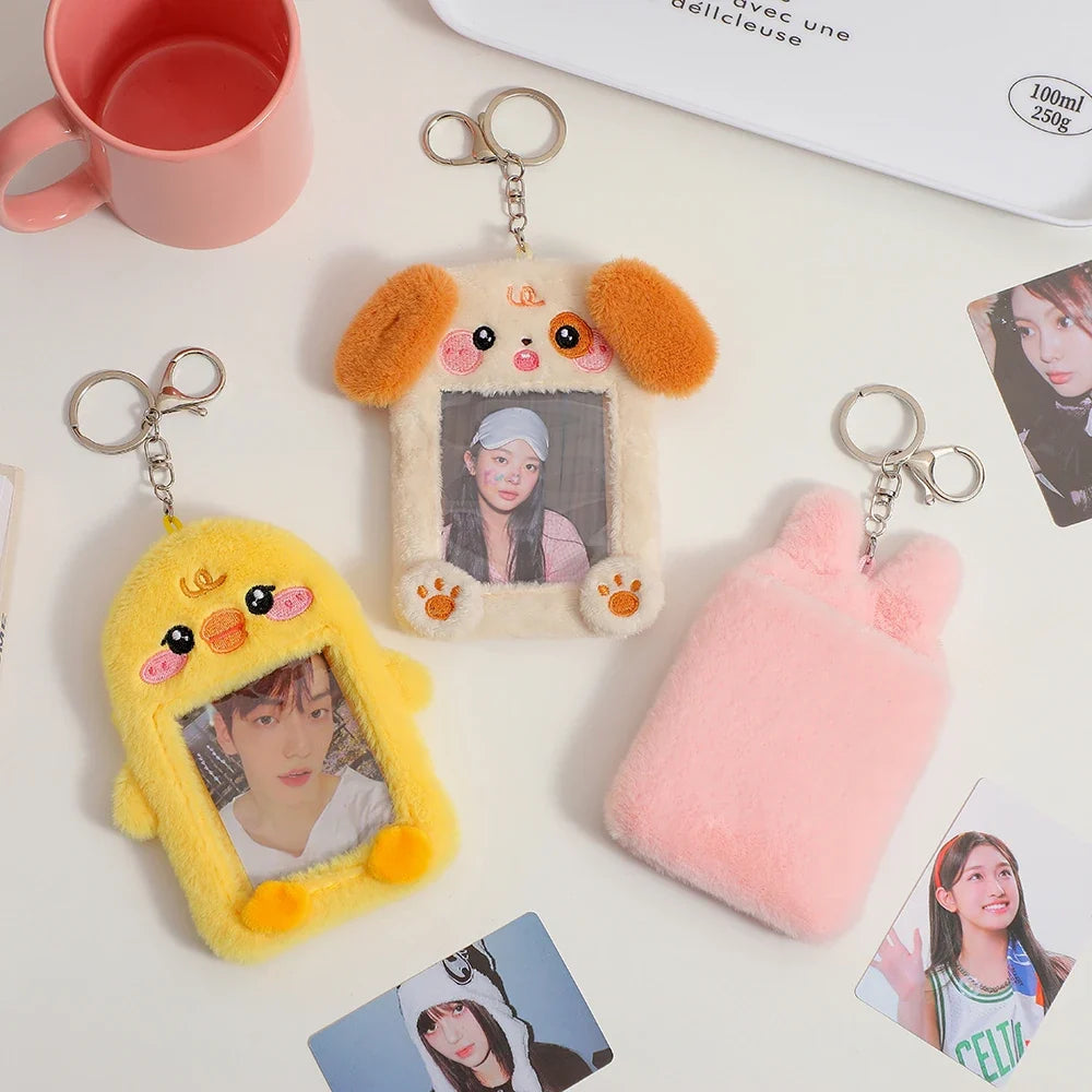 Plush animal photo card holder keychains with dog and cat faces, each with a key ring