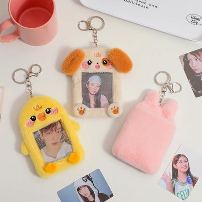 Plush animal photo card holder keychains with dog and cat faces, each with a key ring