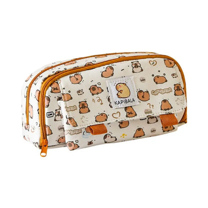 Capybara print pencil bag with front flap pocket, orange trim, and white patch label