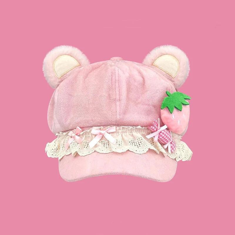 Pink bear cap with lace ruffle, check bow strap, green strawberry applique