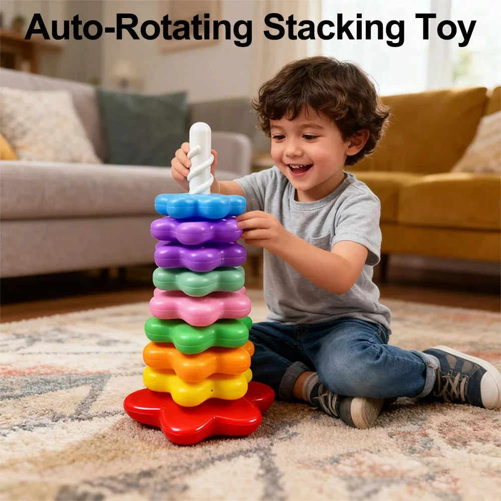 Rainbow rotating stacking tower toy with white pole and colorful disc stack for babies