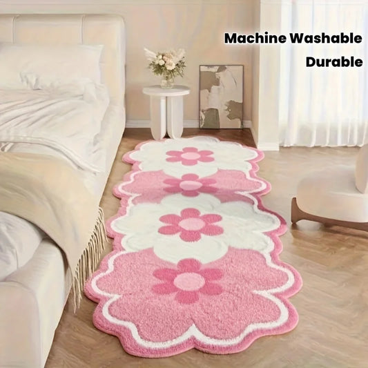 Pink and white scalloped plush floral rug runner; machine-washable and durable design.