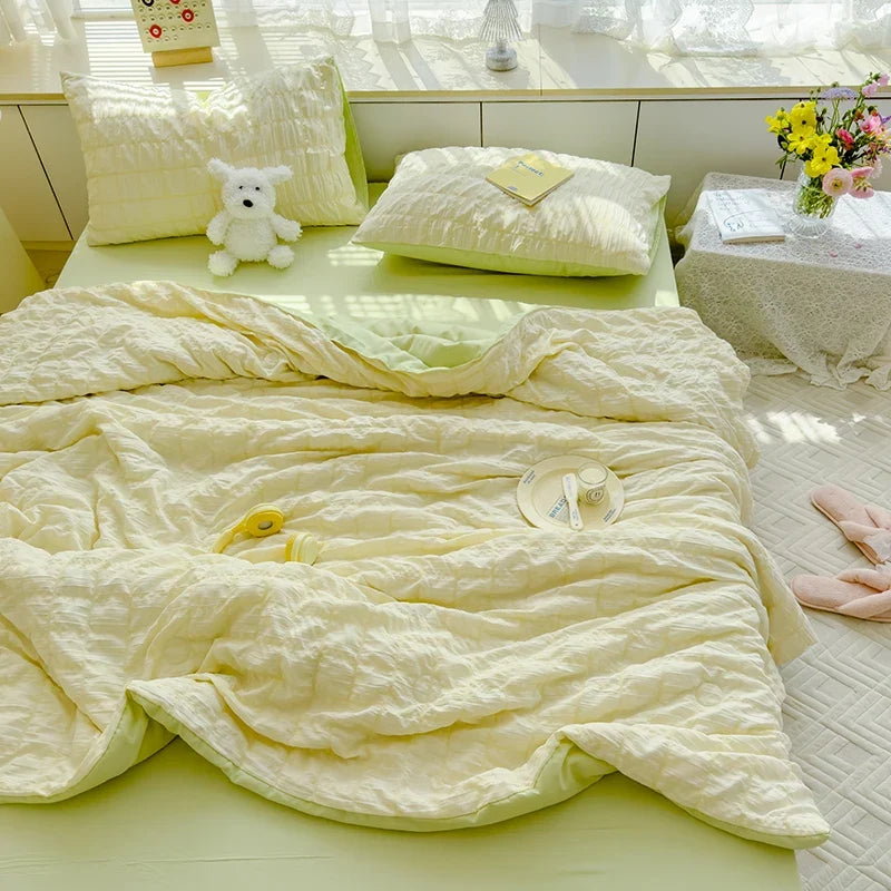 Yellow seersucker duvet cover set with matching pillow shams and crinkle texture