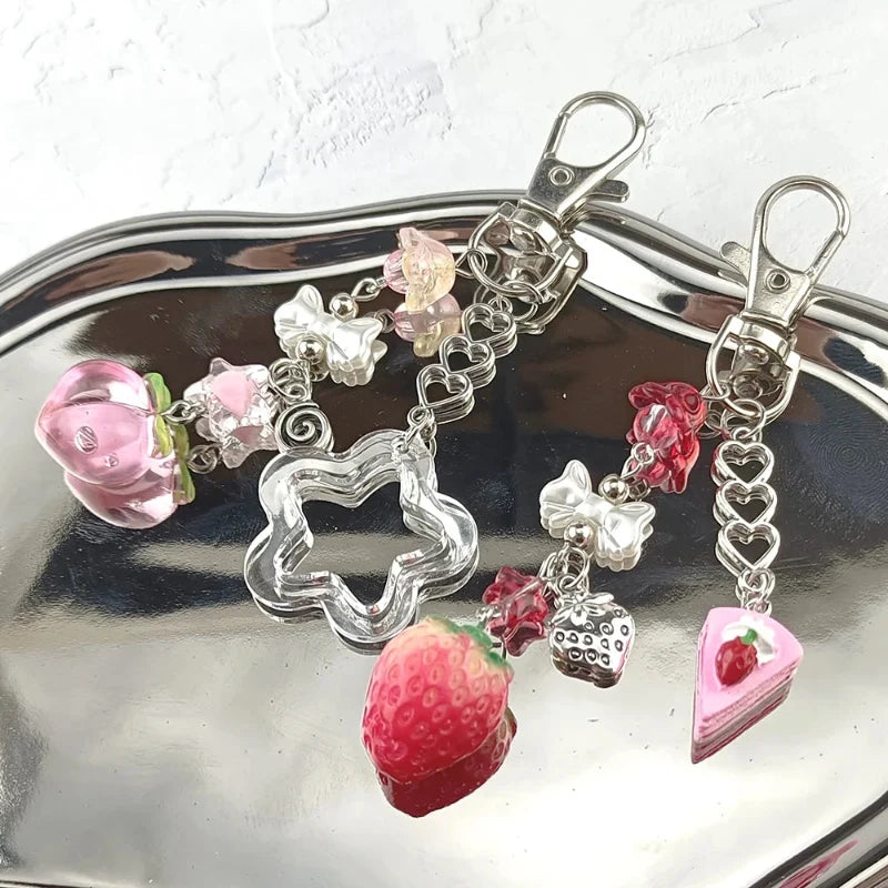 Kawaii fruit bag charms with strawberry, bow, unicorn, and heart links