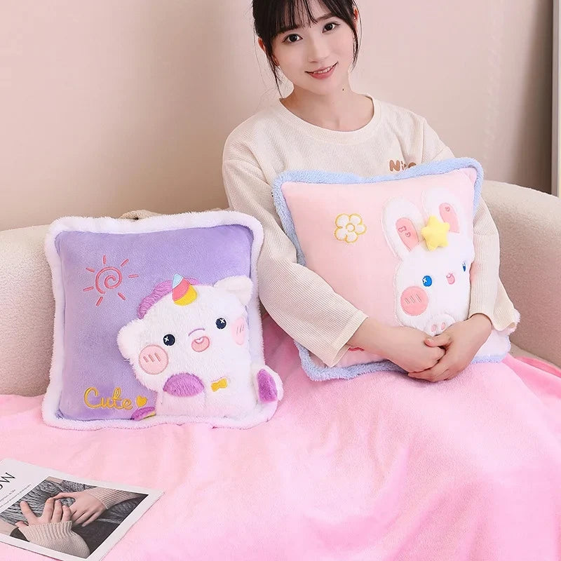 Kawaii pillow and blanket set with pink and light blue plush pillows, cute bunny faces