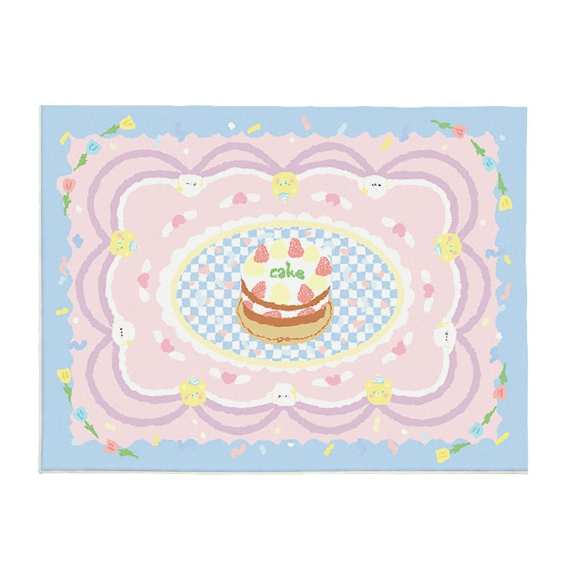 Pastel plush area rug with cake and bunny motifs on light blue