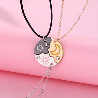 Two-tone moon and sun yin-yang round pendant necklace on black cord and gold chain