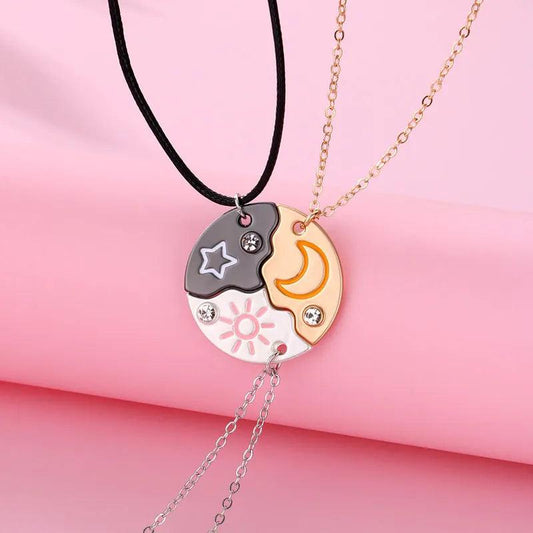 Two-tone moon and sun yin-yang round pendant necklace on black cord and gold chain