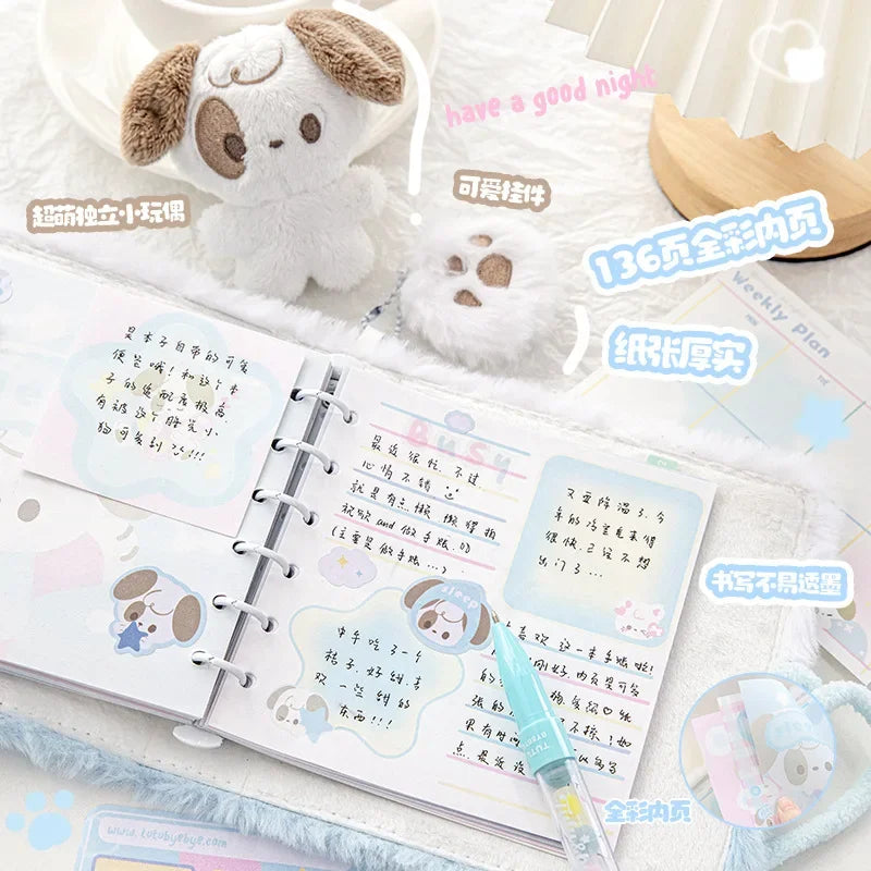 Plush puppy notebook with spiral binding, open pages, and small plush dog accessory