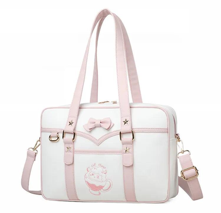 Kawaii messenger bag with white body, pink trim, bow detail, and star accents on front
