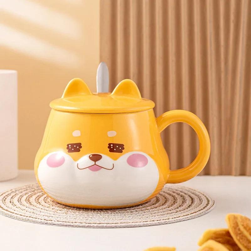 Yellow dog-face mug with lid and side handle, full front view with coaster