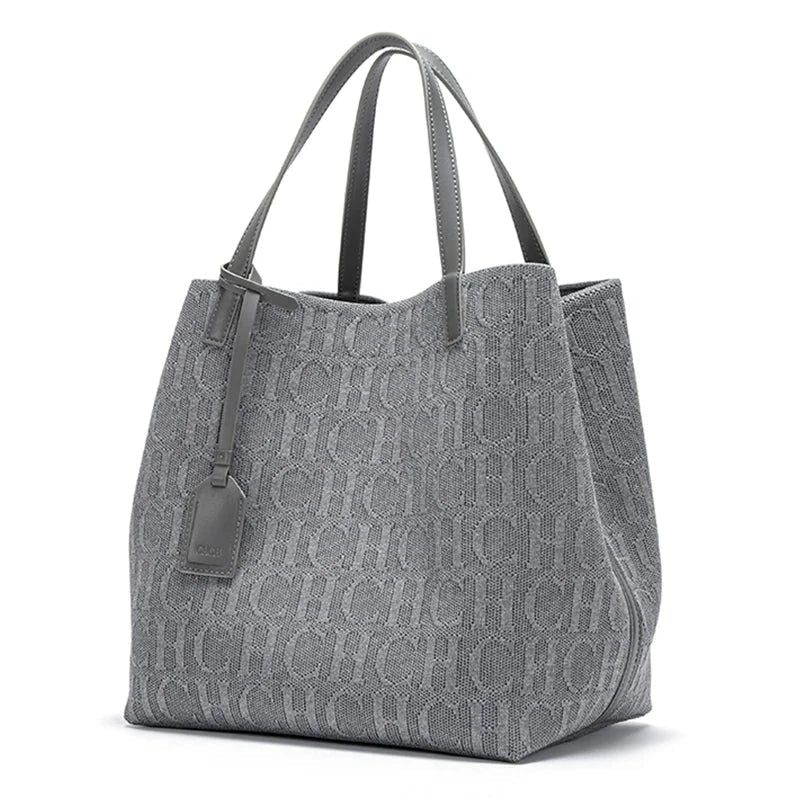 Large knitted tote bag with allover monogram pattern and two top handles, gray