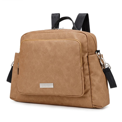 Brown diaper bag backpack with front flap pocket and adjustable shoulder straps