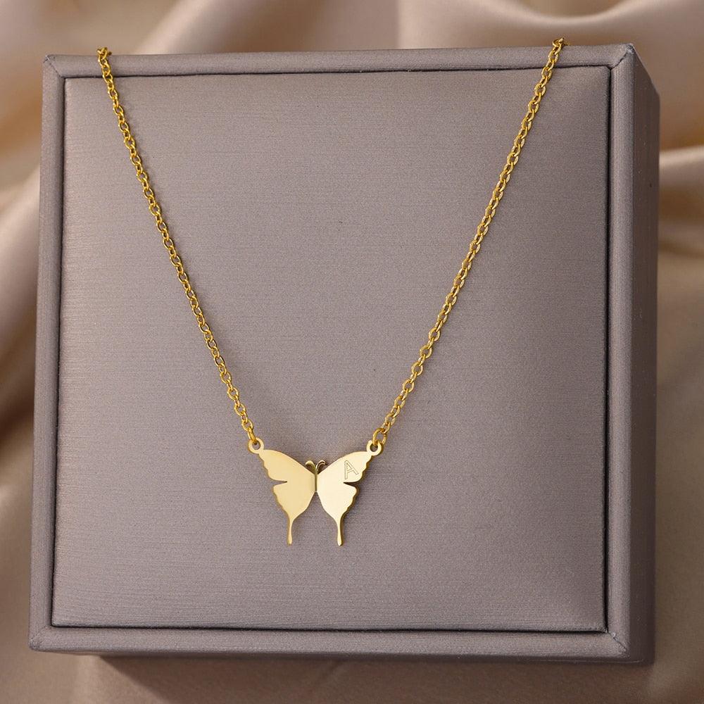 Butterfly pendant necklace with dangling wings, gold-tone chain