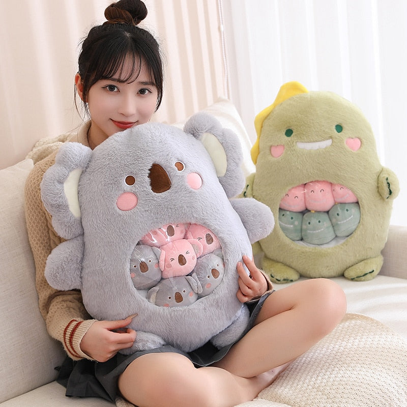 Plush animal shaped pillow in light grey, bear face with rainbow-like inner pattern