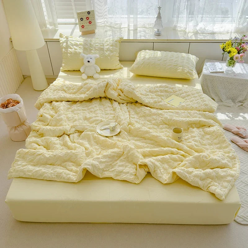 Yellow seersucker duvet cover set with pillow shams and crinkle quilted texture