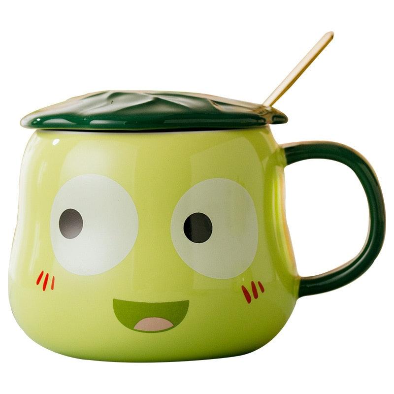 Frog-shaped mug with lid and spoon, lime green with large eyes and green handle, close view